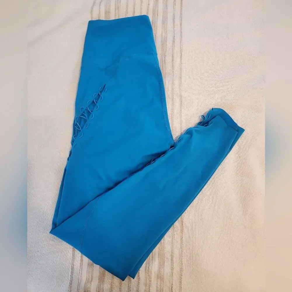 NIKE Dri fit Bungee Detail workout leggings In Aqua Blue XS